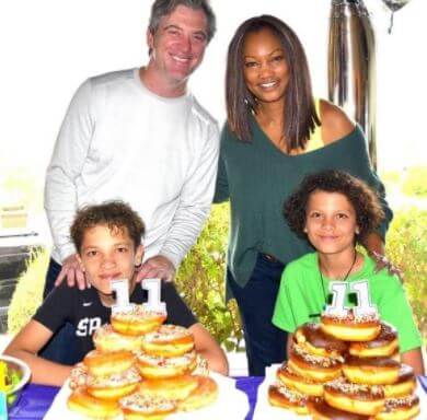 Jax Joseph Nilon with his parents Michael Nilon and Garcelle Beauvais and sibling Jaid Thomas Nilon at their 11th birthday